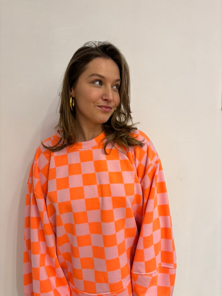 Pien geblokte sweater oranje/paars